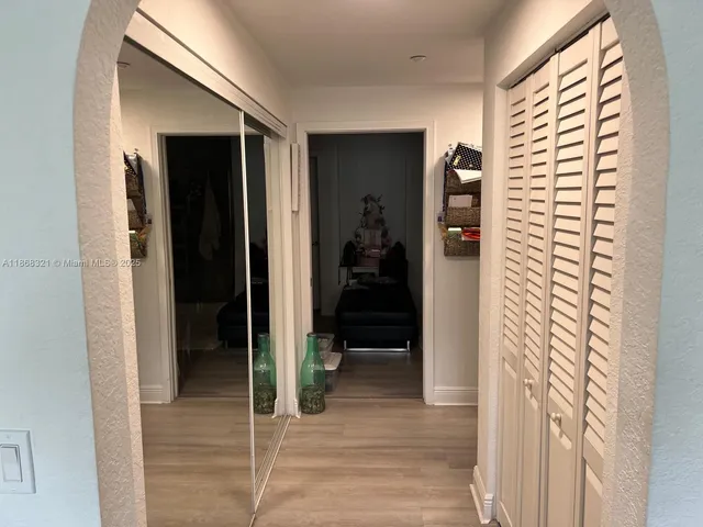 a bathroom with a sink vanity and mirror