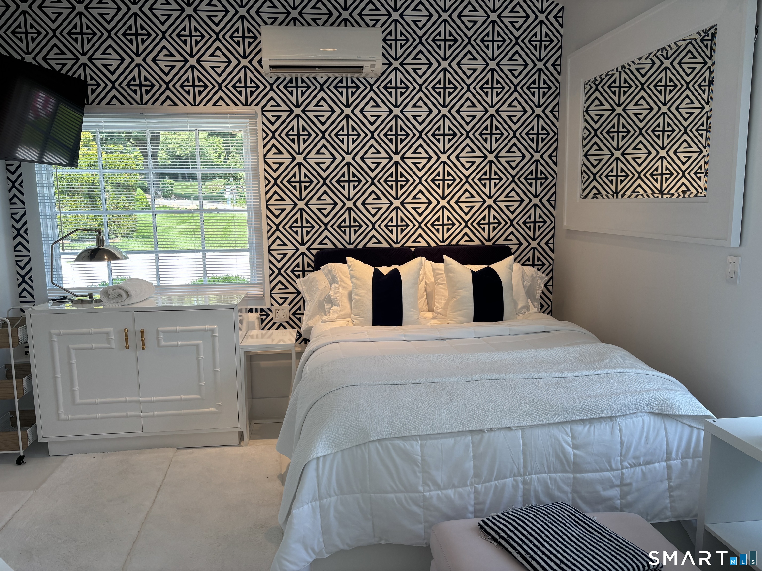 4 A Stoneboat Road Westport, CT 06880 - Photo 17 of 24 a bedroom with a bed and a window