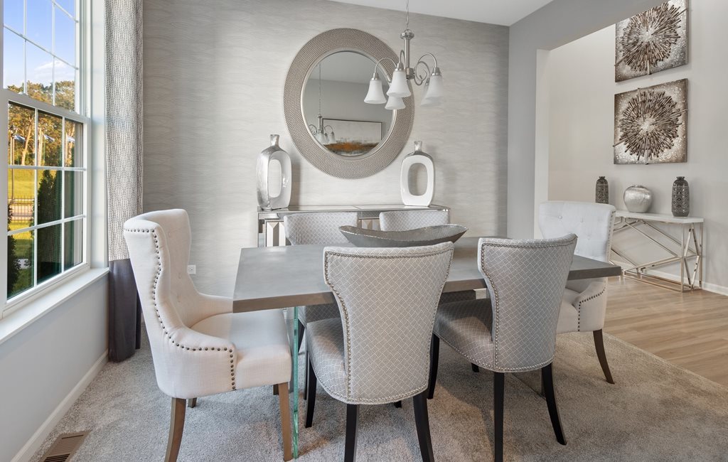 3593 Emerald Road Elgin, IL 60124 - Photo 3 of 13 a dining room with furniture and a mirror
