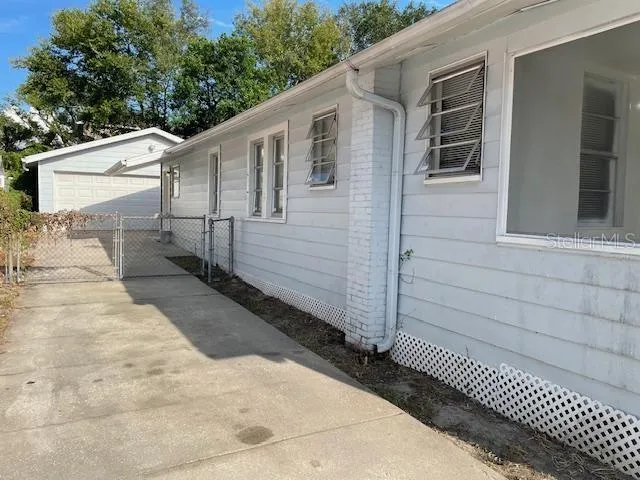 a view of a back yard of the house