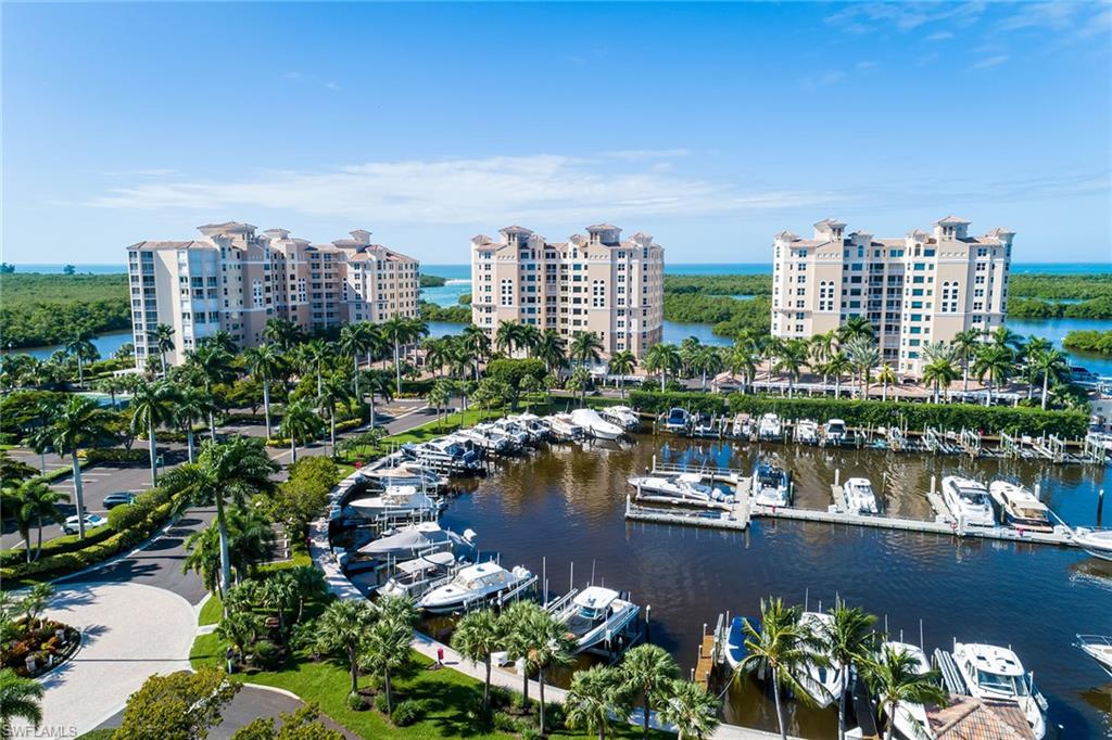 435 Dockside Drive, Unit B703 Naples, FL 34110 - Photo 1 of 38 a view of a city with tall buildings
