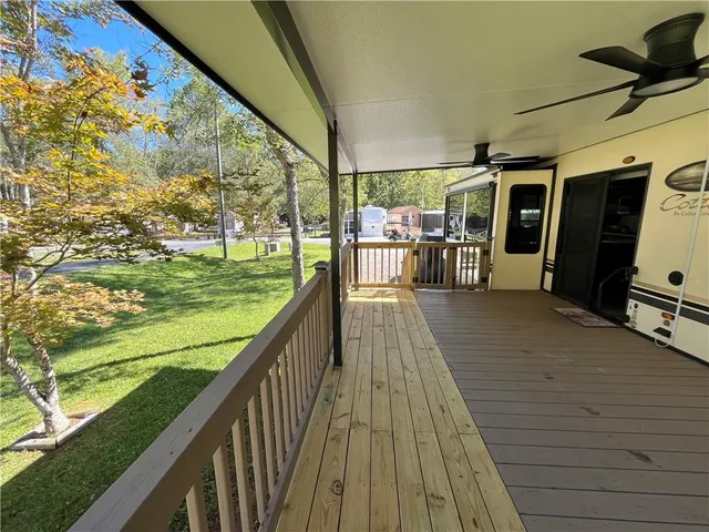 a living room with lots of furniture and a window