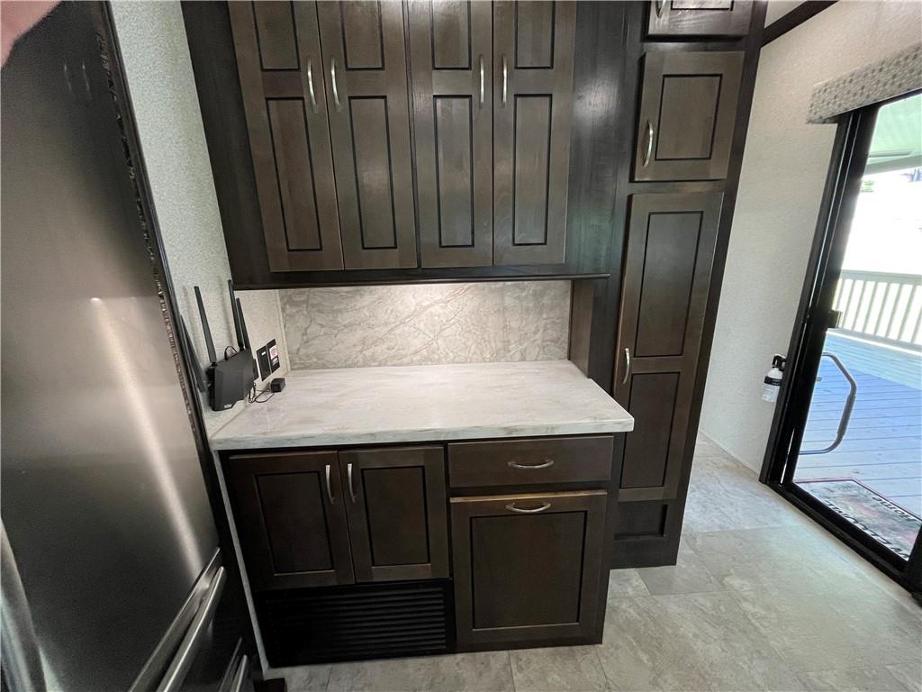 94 Bridge Loop Drive Cleveland, GA 30528 - Photo 23 of 79 a view of a bathroom with a sink and wooden floor