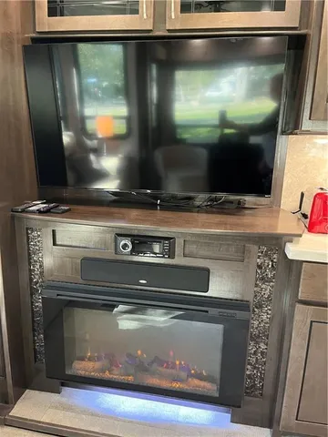 a view of a park with large trees