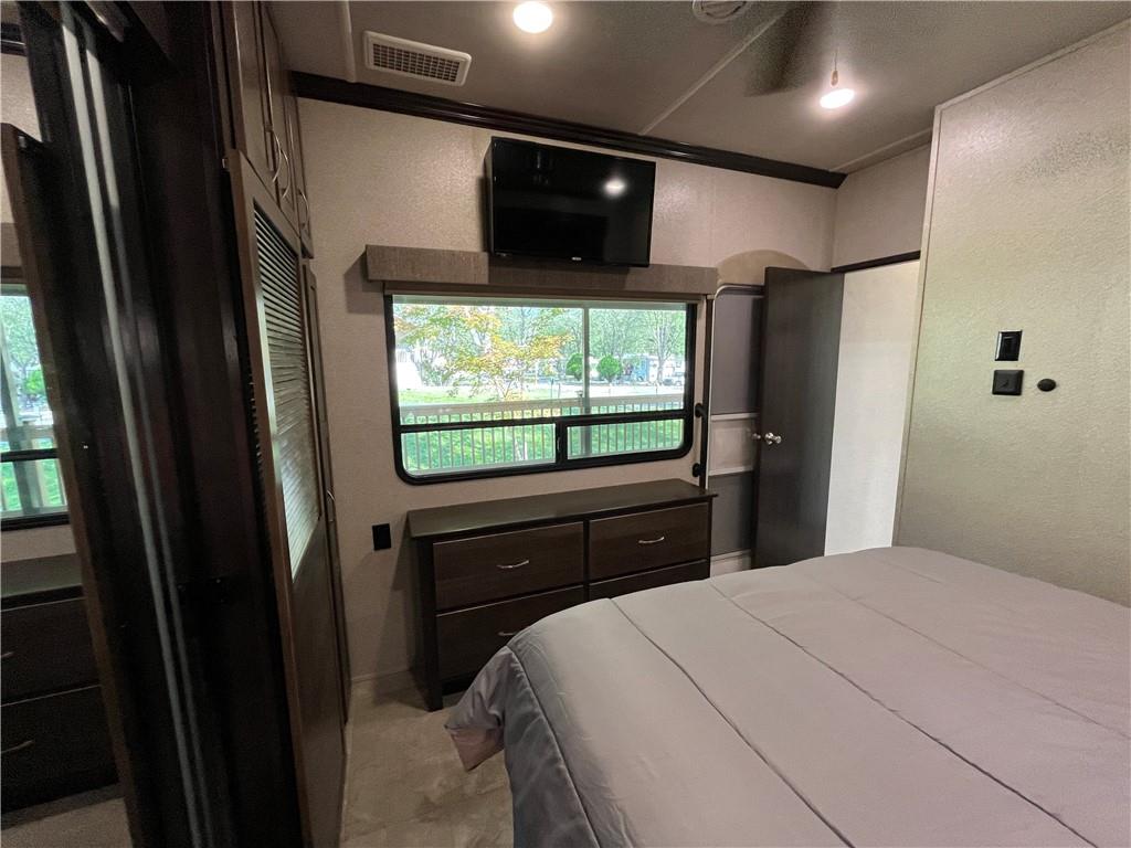 94 Bridge Loop Drive Cleveland, GA 30528 - Photo 38 of 79 a bedroom with a bed and a window