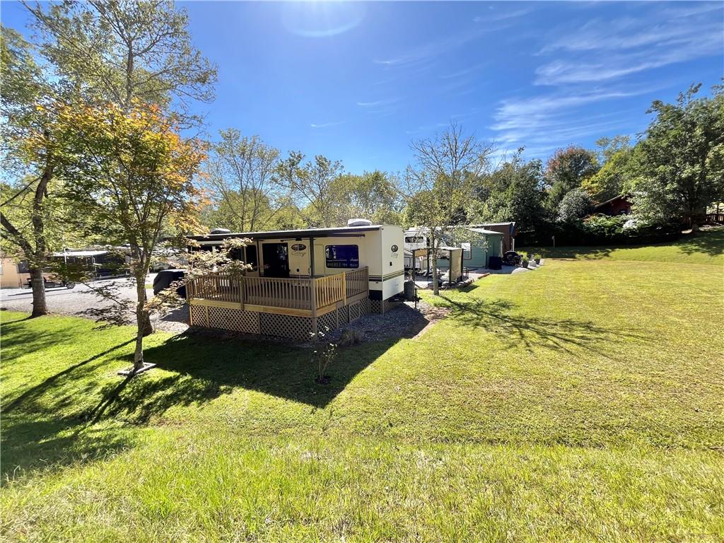 94 Bridge Loop Drive Cleveland, GA 30528 - Photo 48 of 79 a view of a swimming pool with a yard