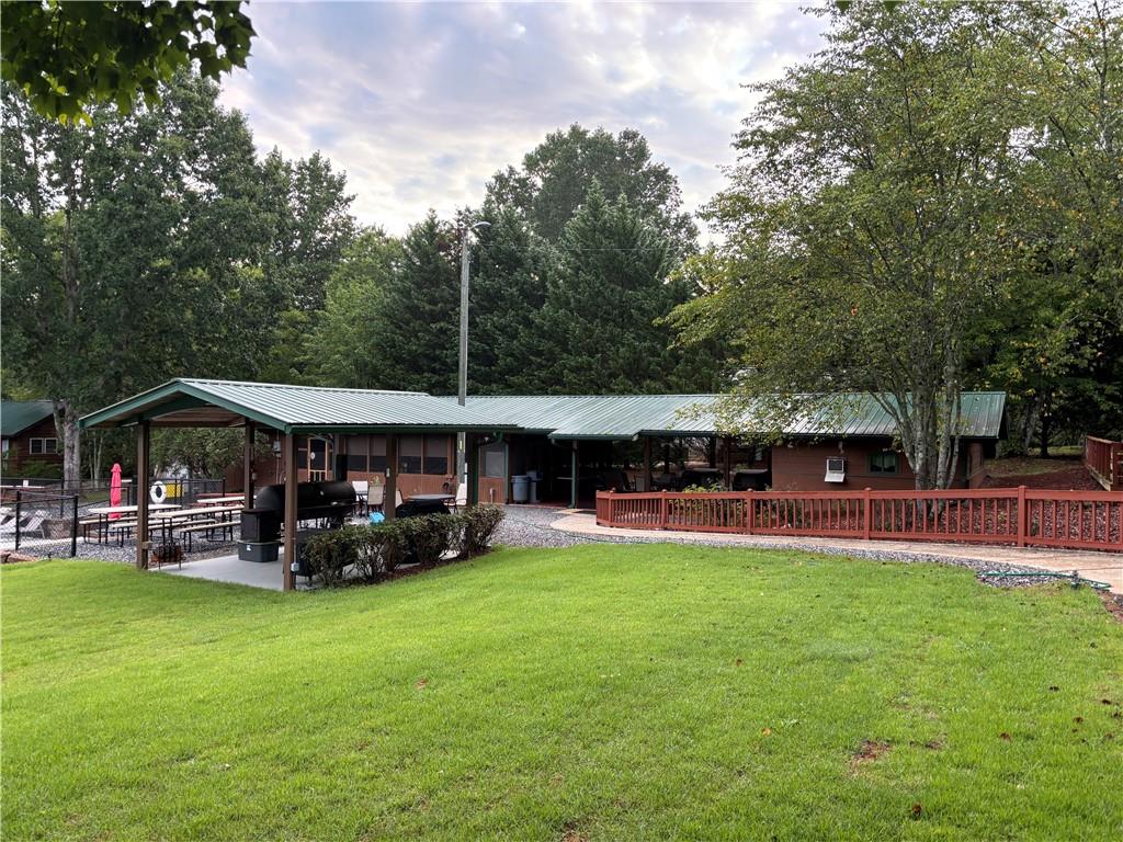 94 Bridge Loop Drive Cleveland, GA 30528 - Photo 55 of 79 a view of a house with a big yard and sitting area