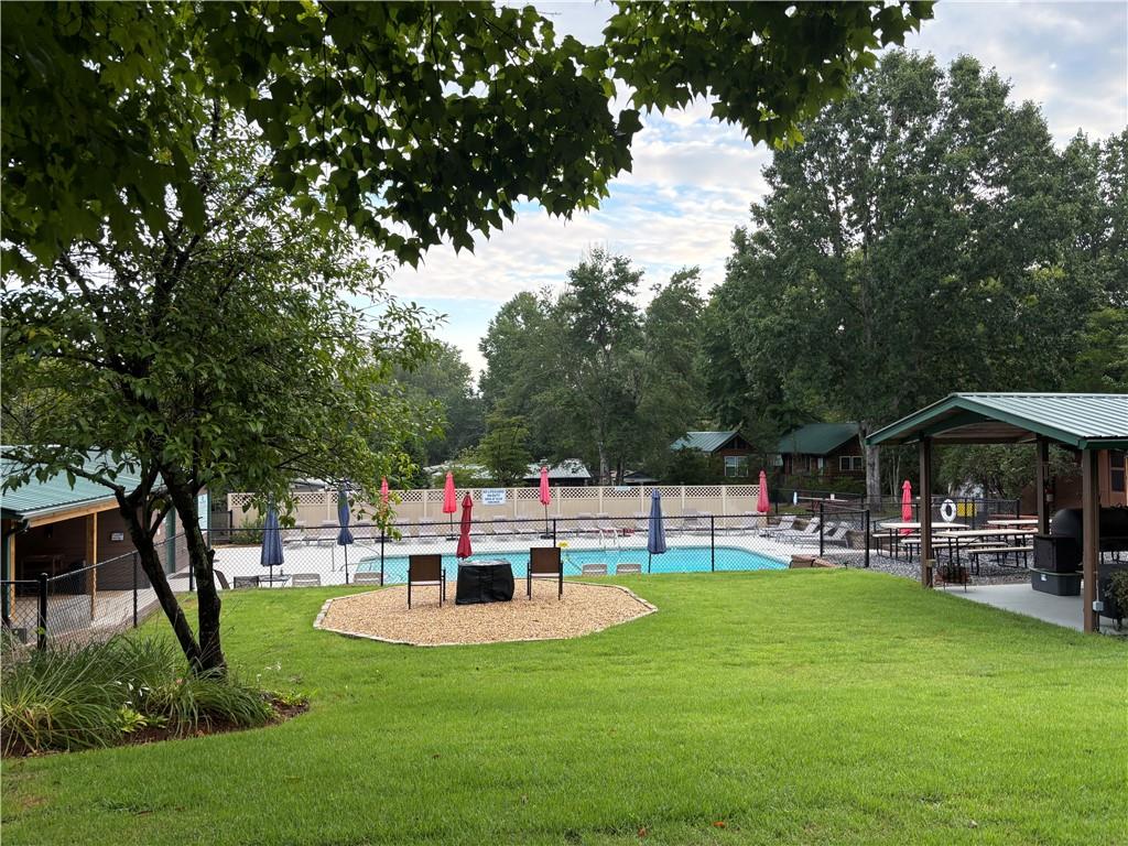 94 Bridge Loop Drive Cleveland, GA 30528 - Photo 56 of 79 a view of a house with a backyard porch and sitting area