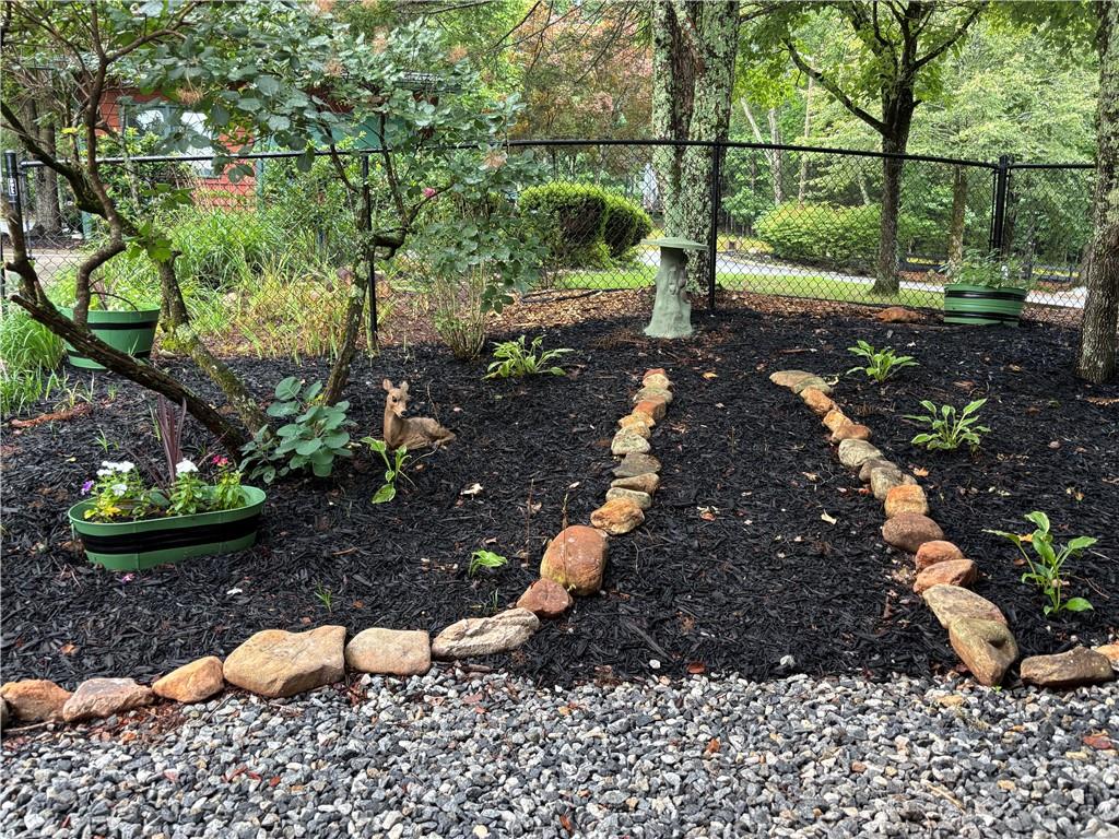 94 Bridge Loop Drive Cleveland, GA 30528 - Photo 67 of 79 a backyard of a house with lots of green space
