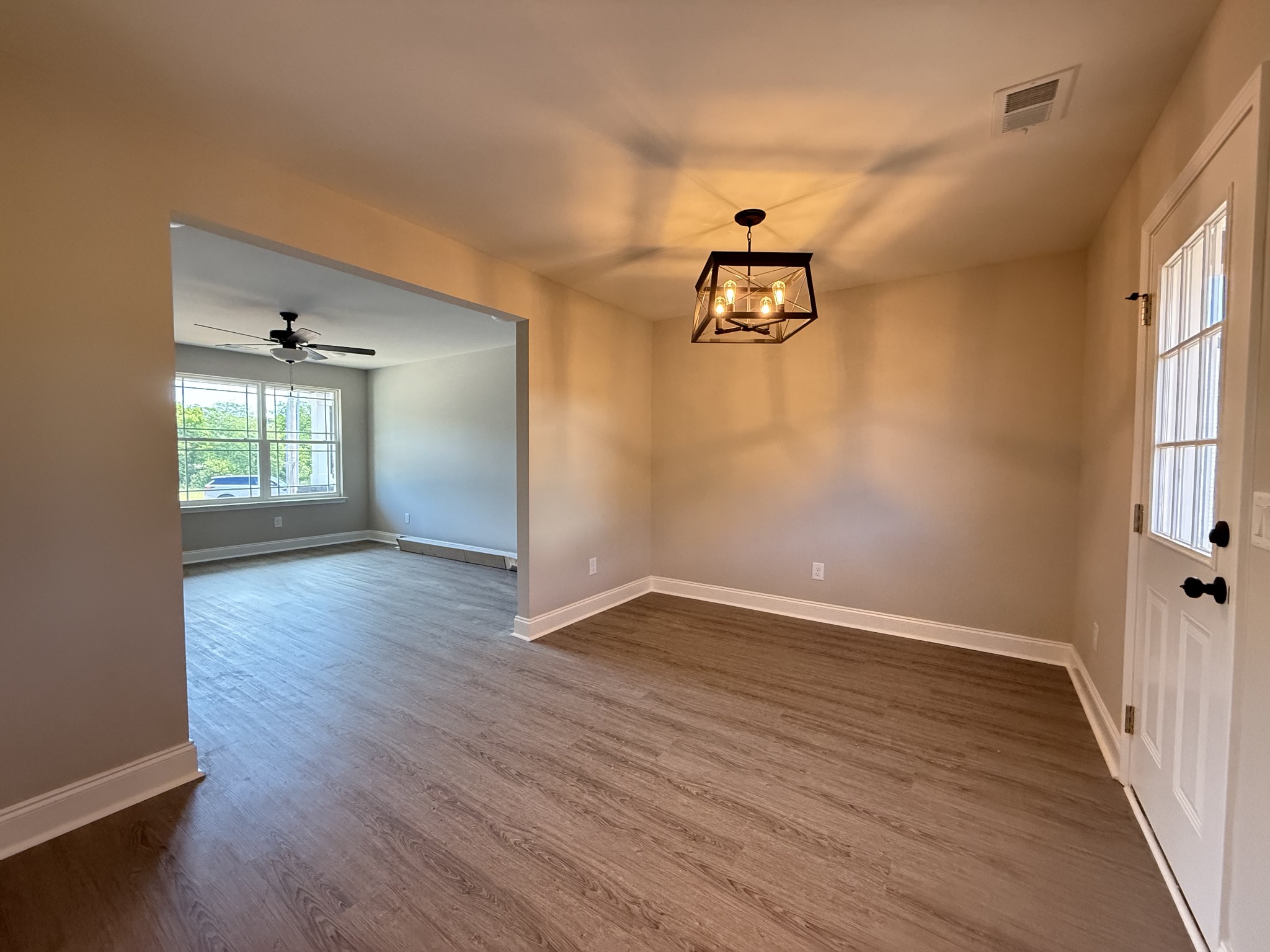 1020 Northside Drive Dickson, TN 37055 - Photo 5 of 10 wooden floor in an empty room with a window