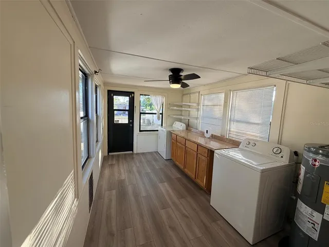 a view of a storage & utility room with washer and dryer