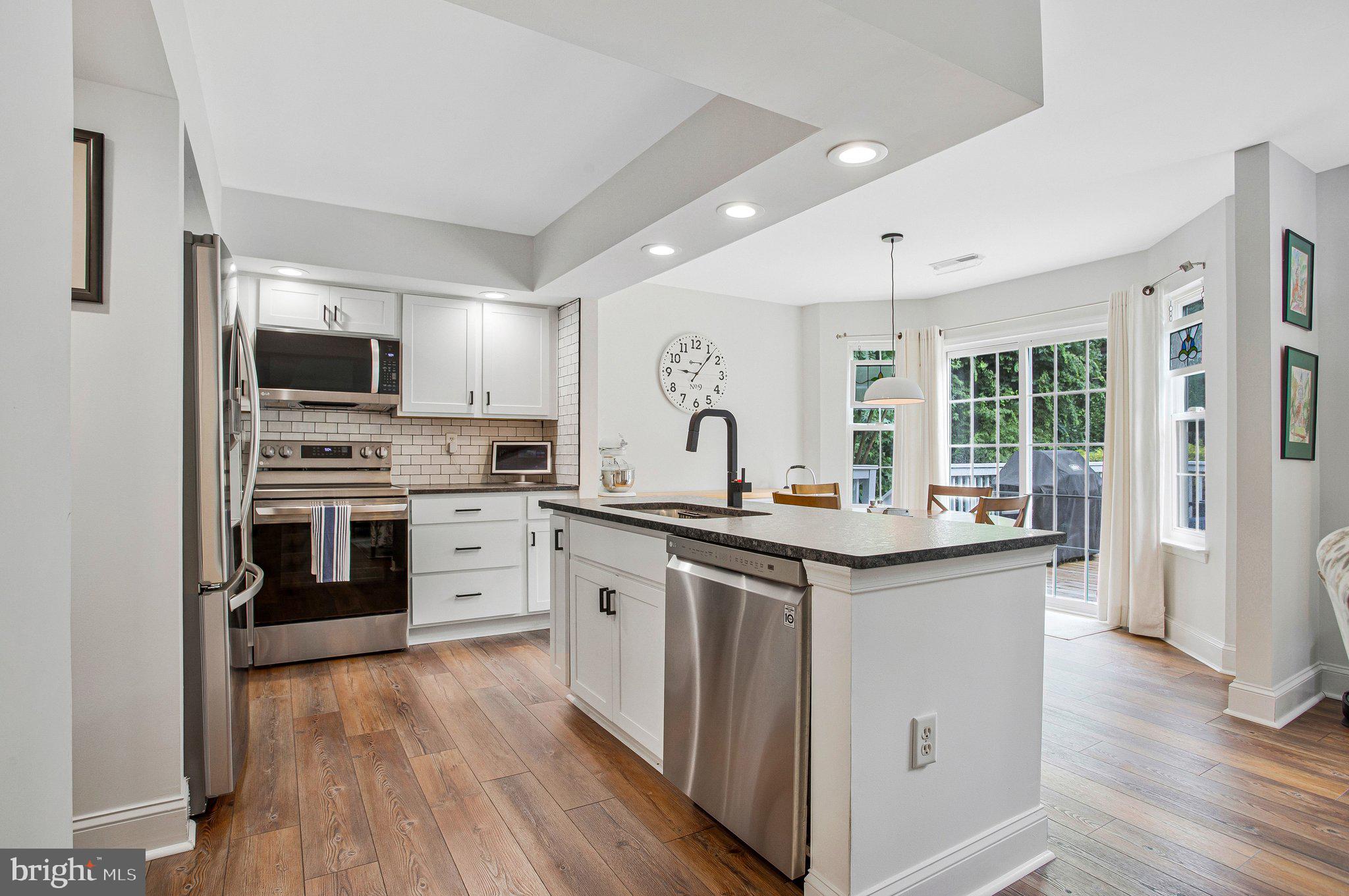 1582 Snug Harbor Road Shady Side, MD 20764 - Photo 17 of 53 Modern kitchen with natural light.