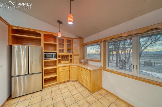 27770 Little Springs Road Calhan, CO 80808 - Photo 9 of 39 New fridge, plenty of pantry space