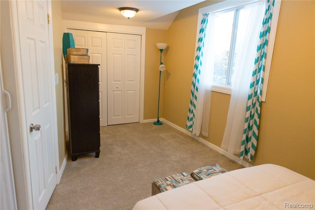 8911 Inkster Road Livonia, MI 48150 - Photo 18 of 40 1st Bedroom Upstairs with large windows allowing plenty of light