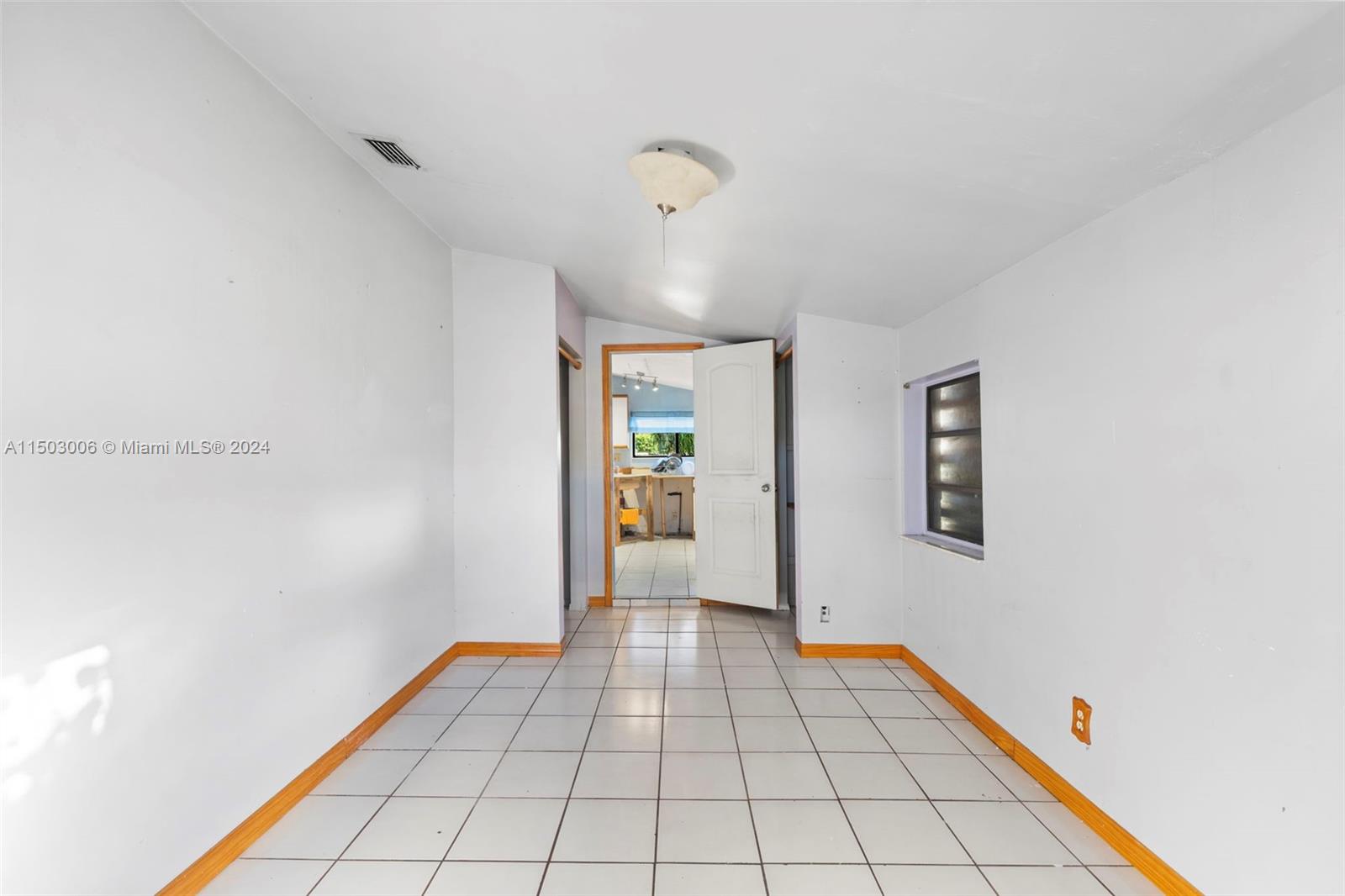 2702 Scott Street Hollywood, FL 33020 - Photo 21 of 42 a view of an empty room and window