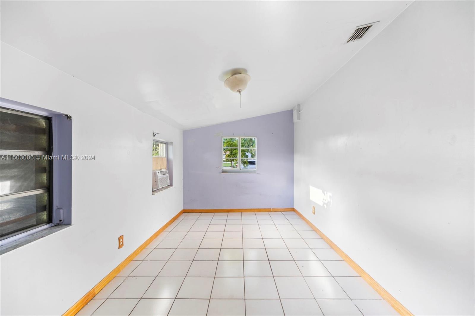 2702 Scott Street Hollywood, FL 33020 - Photo 22 of 42 a view of an empty room and window