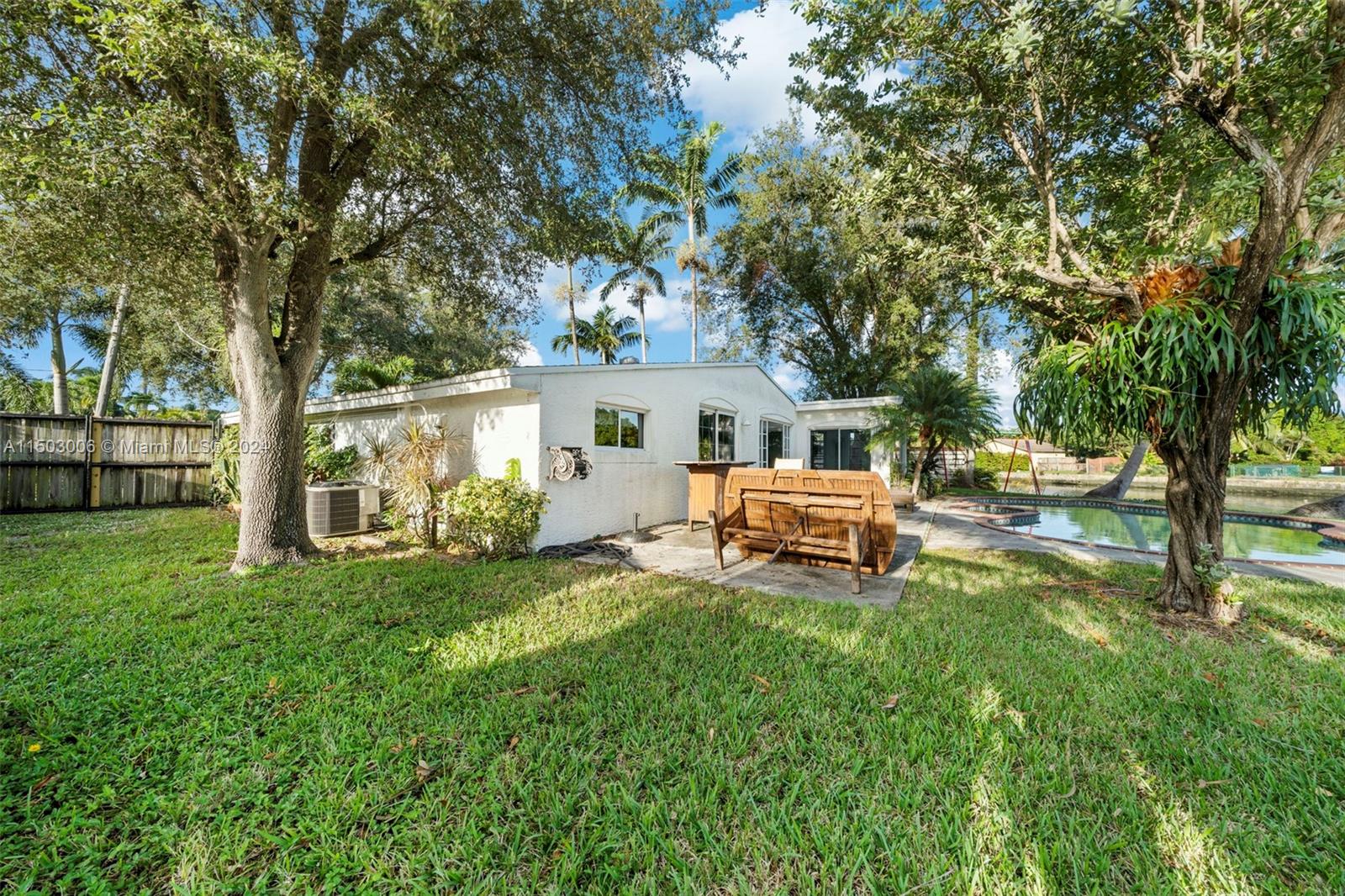 2702 Scott Street Hollywood, FL 33020 - Photo 34 of 42 a house view with a sitting space and garden
