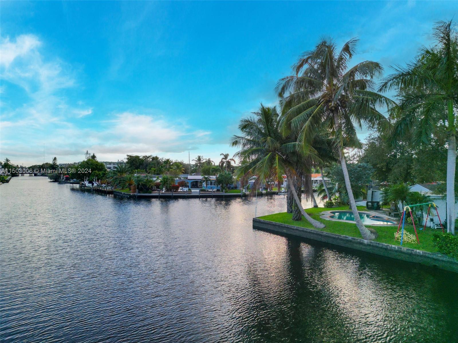 2702 Scott Street Hollywood, FL 33020 - Photo 8 of 42 a view of a lake with houses