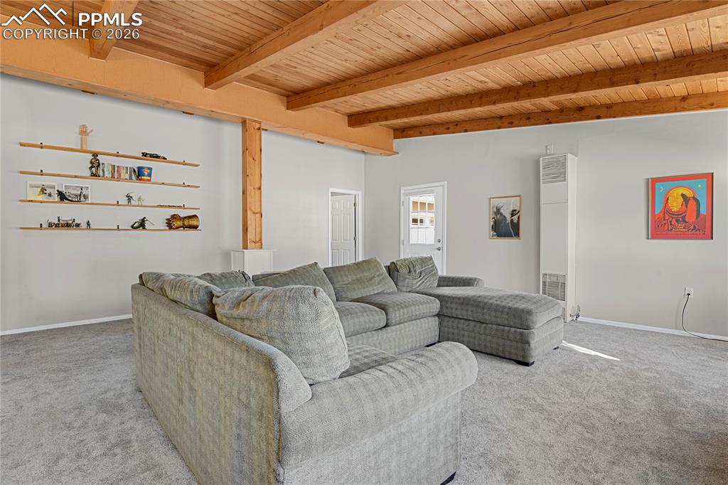 7015 McFerran Road Colorado Springs, CO 80908 - Photo 18 of 50 a living room with furniture and painting on the wall