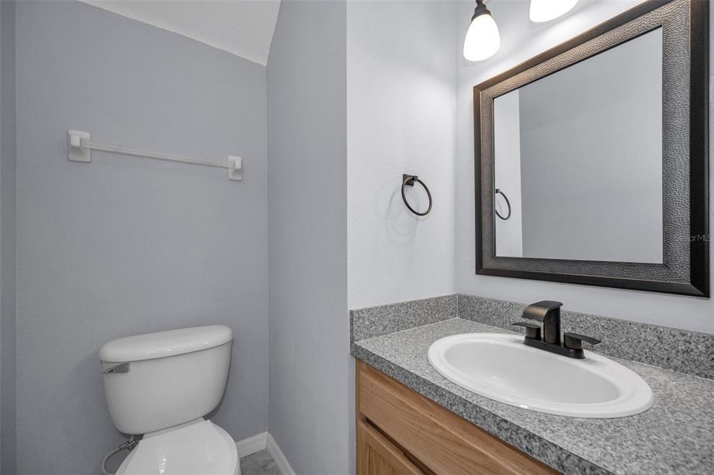 10125 Palladio Drive New Port Richey, FL 34655 - Photo 22 of 97 a bathroom with a sink and a toilet