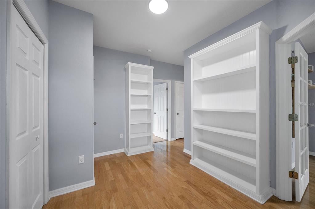 10125 Palladio Drive New Port Richey, FL 34655 - Photo 40 of 97 a view of room with wooden floor