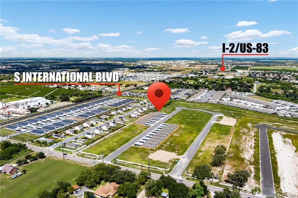 1604 Shadow Creek, Unit 1 Weslaco, TX 78596 - Photo 19 of 19 a view of a swimming pool with a yard