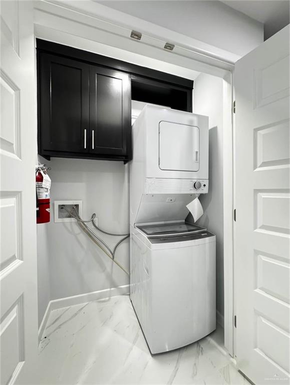 1604 Shadow Creek, Unit 1 Weslaco, TX 78596 - Photo 6 of 19 a kitchen with stainless steel appliances granite countertop a sink and a stove