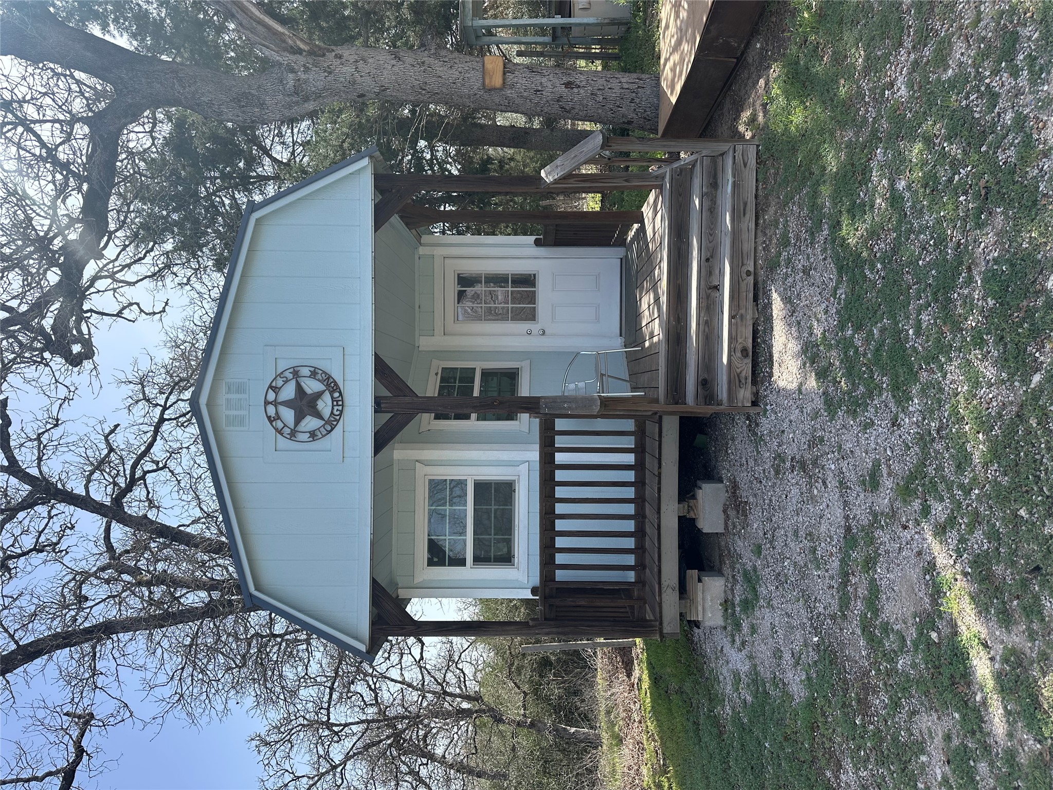 1218 Private Road 3063 Thrall, TX 76578 - Photo 21 of 29 a view of a house with a yard and wooden fence