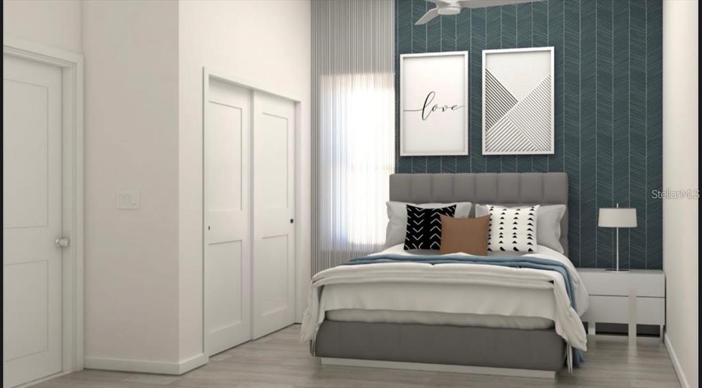 4254 Enid Lane North Port, FL 34288 - Photo 19 of 24 a bedroom with a bed and a mirror