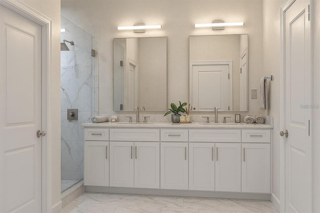 4254 Enid Lane North Port, FL 34288 - Photo 20 of 24 a bathroom with double sink and a mirror