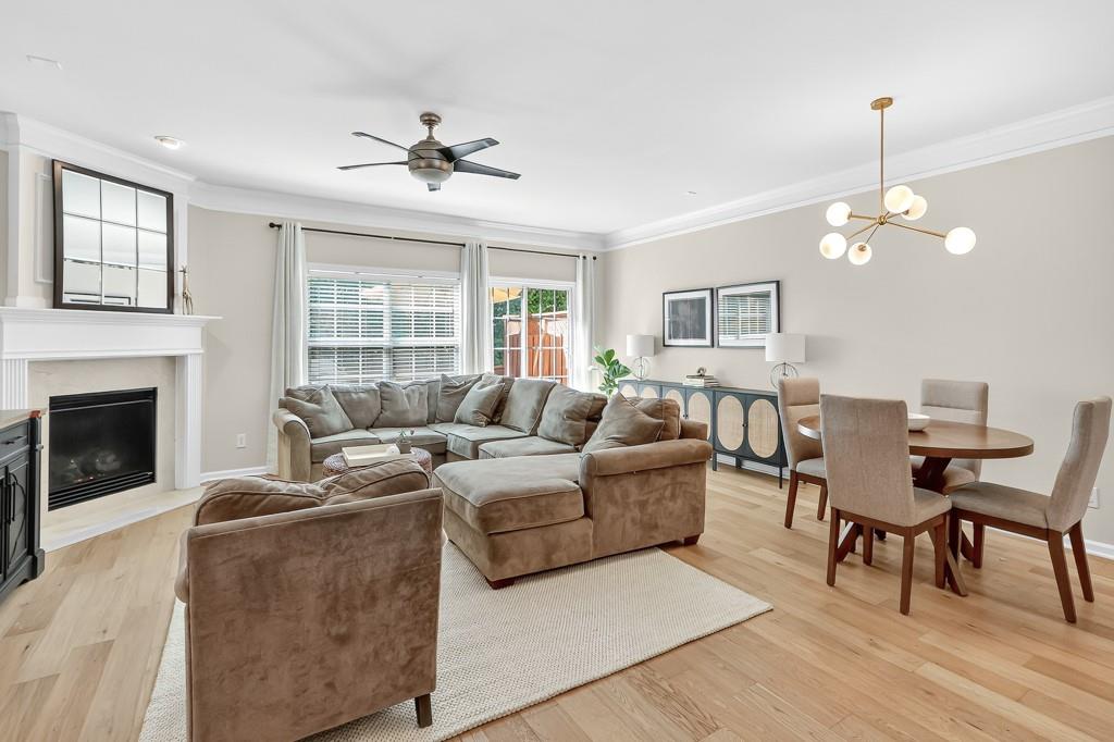 635 Coligny Court Atlanta, GA 30350 - Photo 6 of 31 a living room with furniture and a fireplace