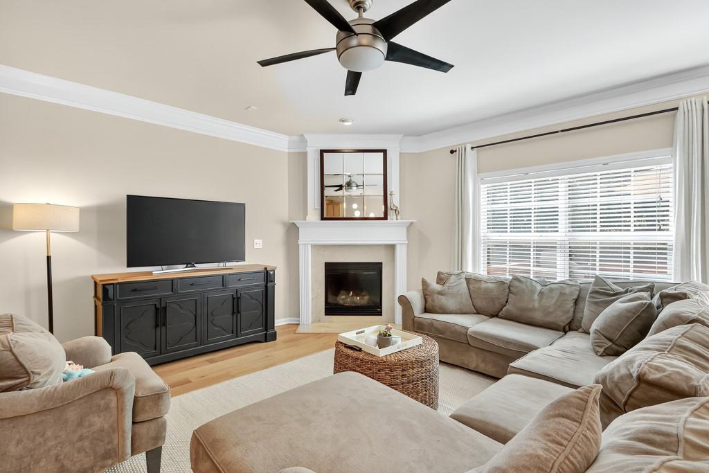 635 Coligny Court Atlanta, GA 30350 - Photo 7 of 31 a living room with furniture a window and a flat screen tv