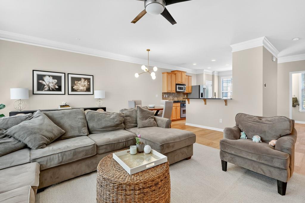 635 Coligny Court Atlanta, GA 30350 - Photo 9 of 31 a living room with furniture and kitchen view