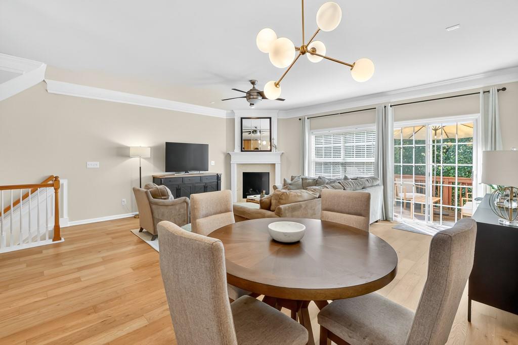 635 Coligny Court Atlanta, GA 30350 - Photo 10 of 31 a living room with fireplace furniture and a flat screen tv