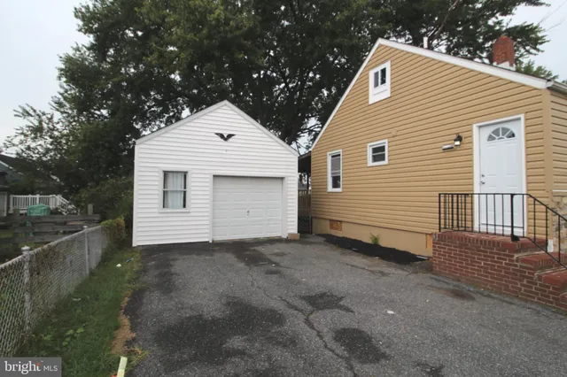 a front view of a house with a garage