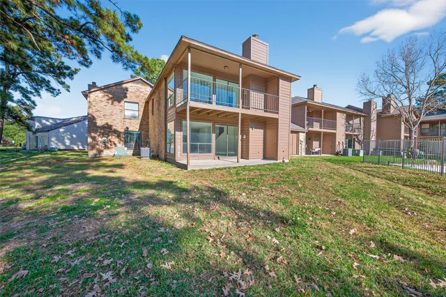 a view of a building with a yard