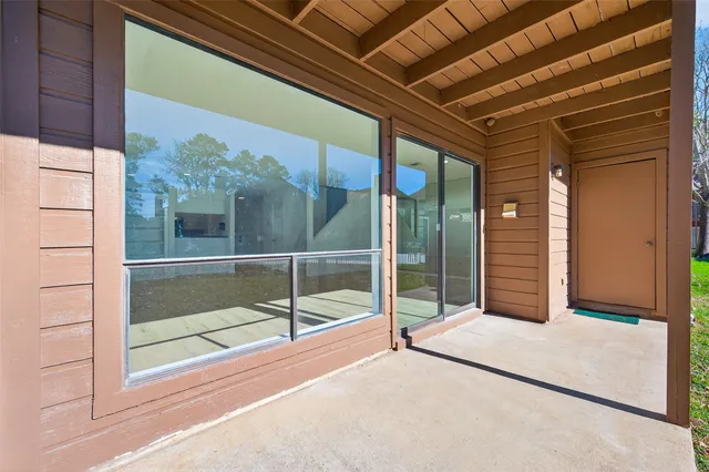 a view of backyard with green space