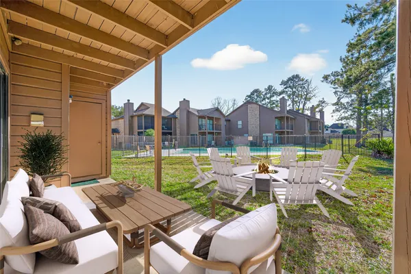 a view of yard with patio