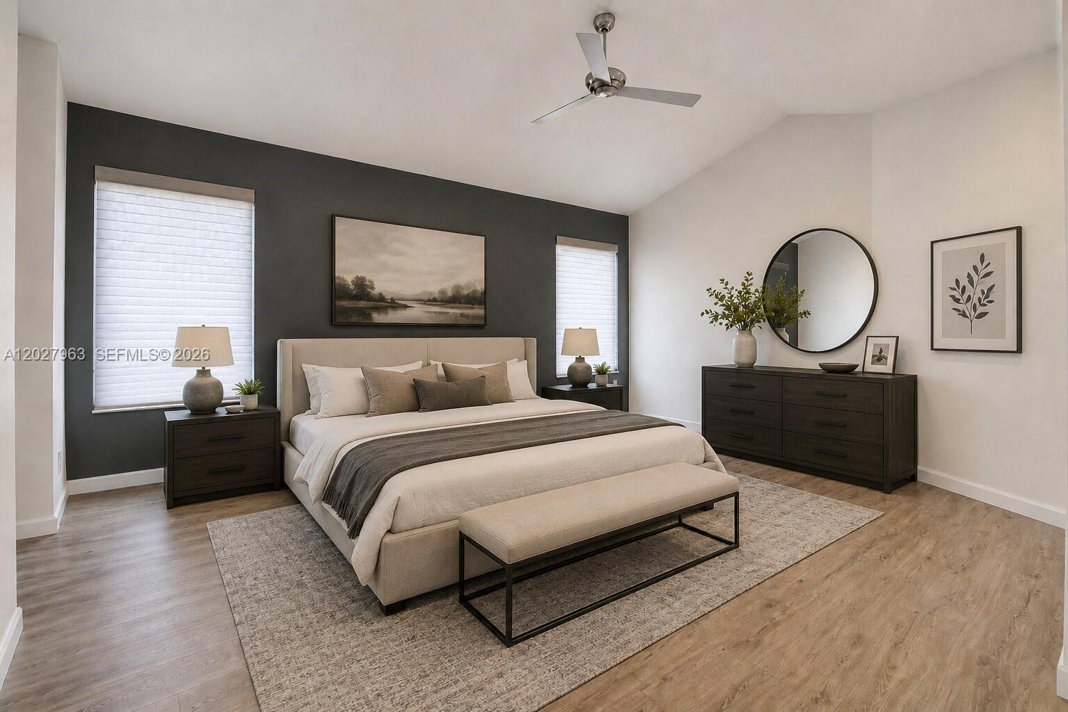 6646 Northwest 25th Terrace Boca Raton, FL 33496 - Photo 18 of 48 a bedroom with bed mirror and window