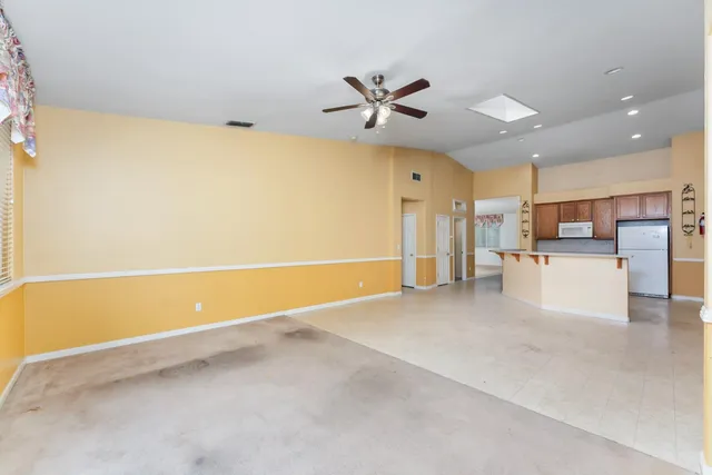 a view of a kitchen with a sink cabinets and window