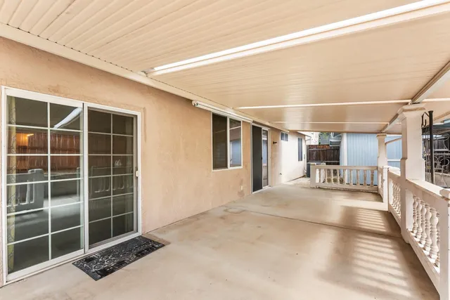 a view of a house with a large window