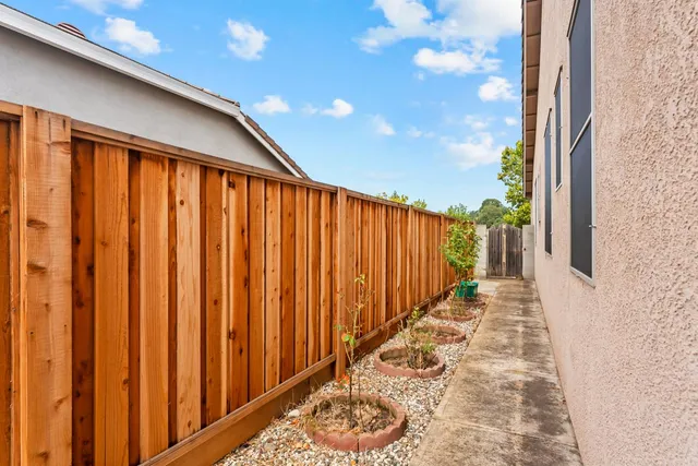 a balcony with trees in front of it