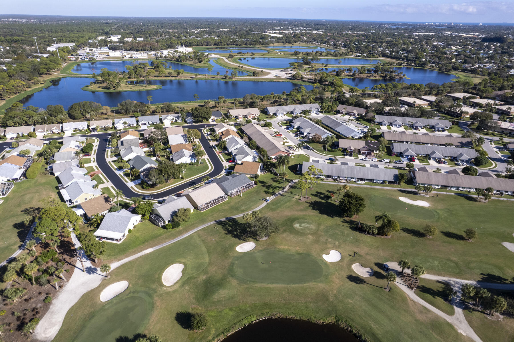 140 Moccasin Trail South Jupiter, FL 33458 - Photo 17 of 18 an aerial view of residential houses with outdoor space