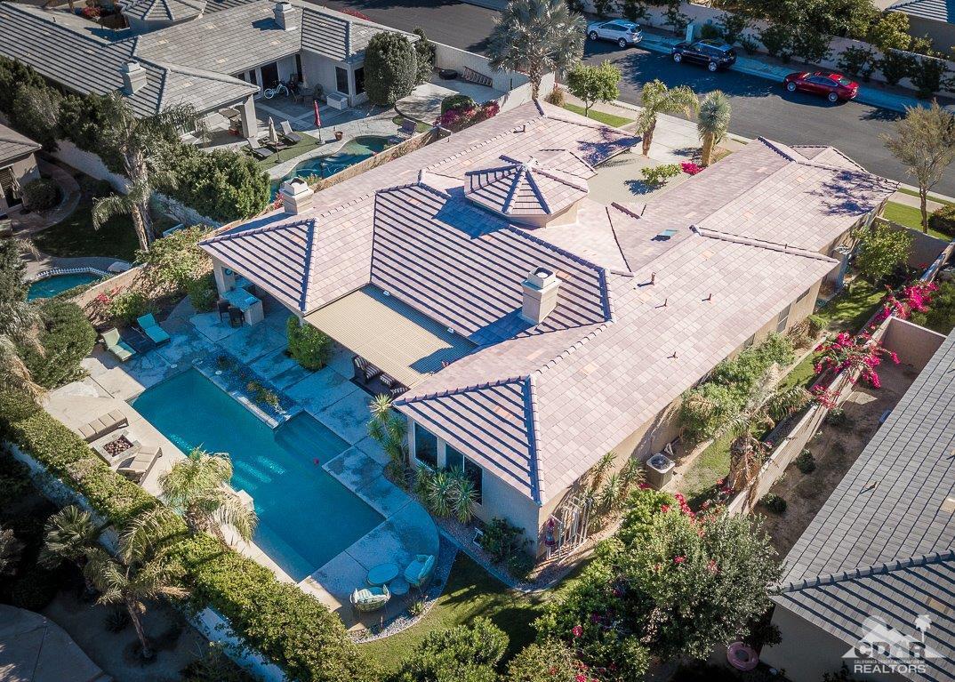 66 Paris Way Rancho Mirage, CA 92270 - Photo 3 of 32 an aerial view of a house with garden