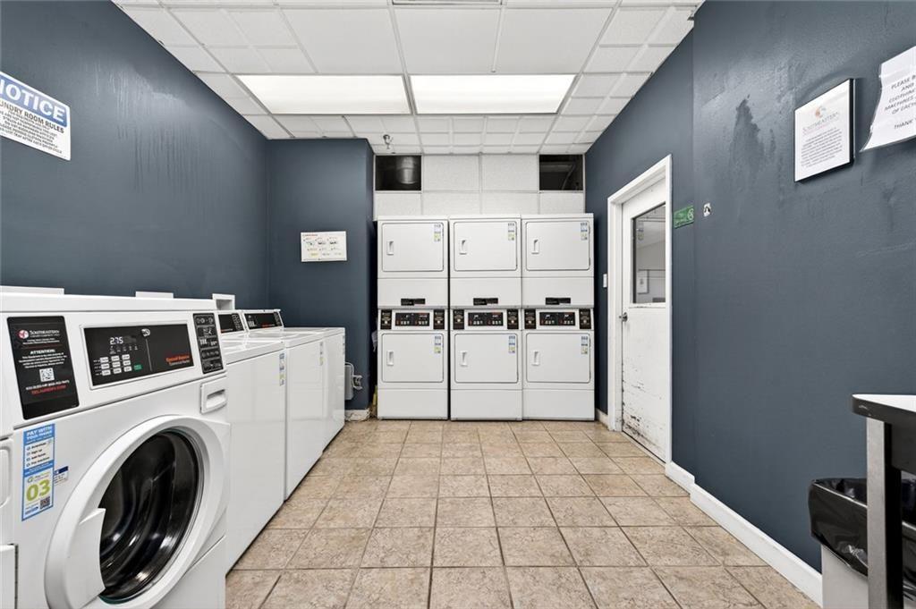 375 Ralph McGill Boulevard Northeast, Unit 604 Atlanta, GA 30312 - Photo 42 of 49 a view of a storage & utility room with washer and dryer