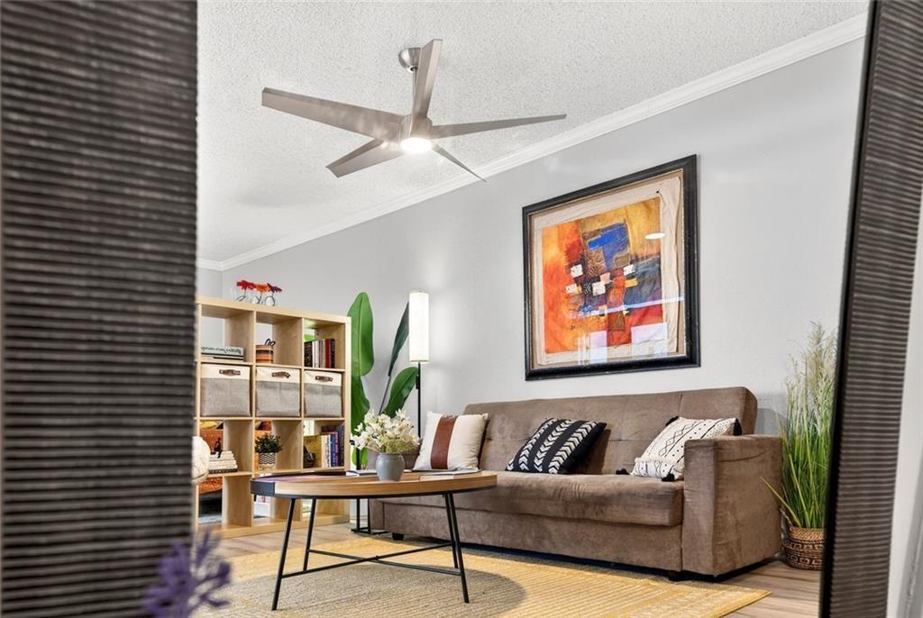 375 Ralph McGill Boulevard Northeast, Unit 604 Atlanta, GA 30312 - Photo 6 of 49 a living room with furniture