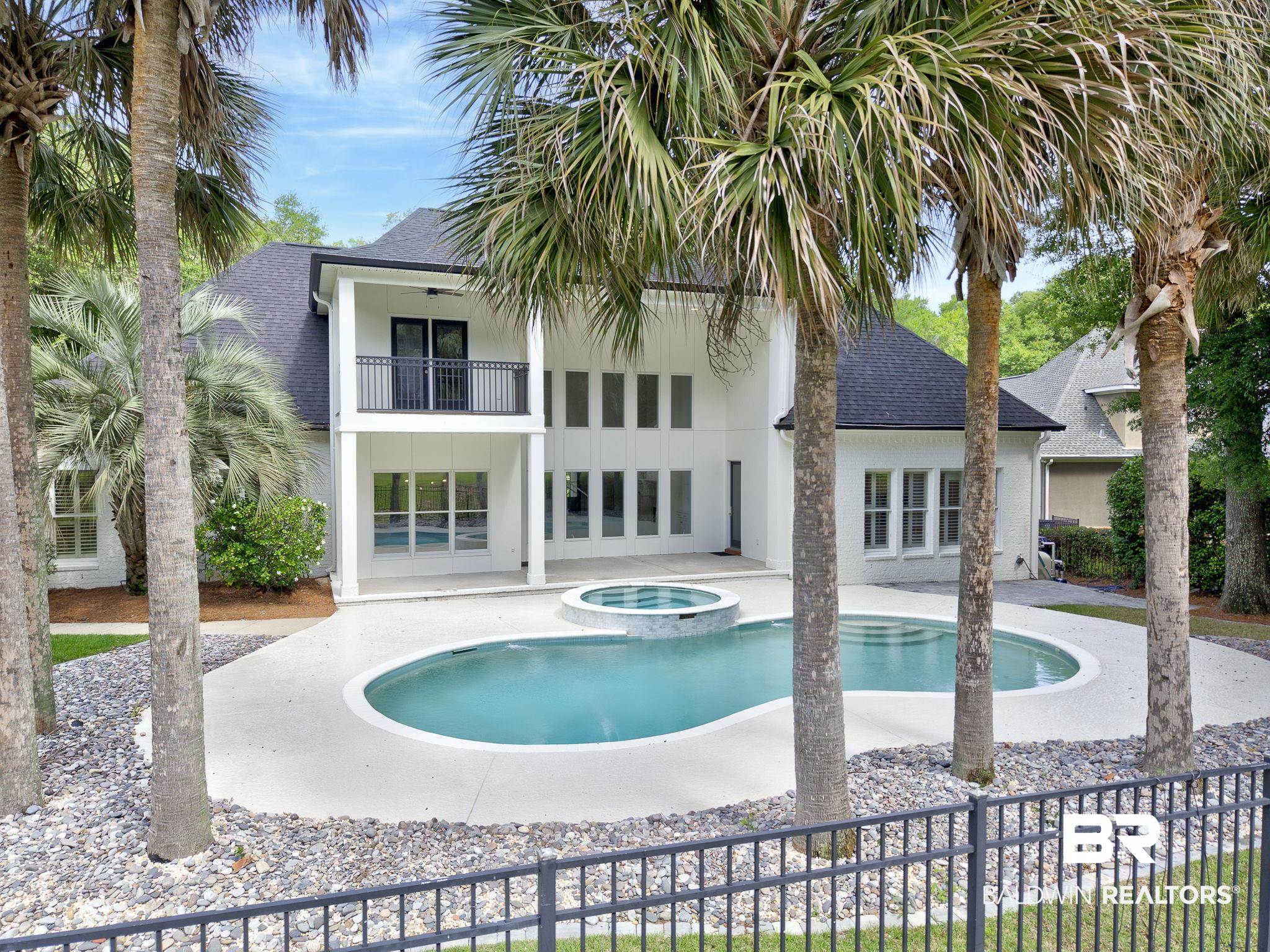 105 High Pines Ridge Fairhope, AL 36532 - Photo 92 of 97 View of swimming pool with an in-ground hot tub, fence, and a patio