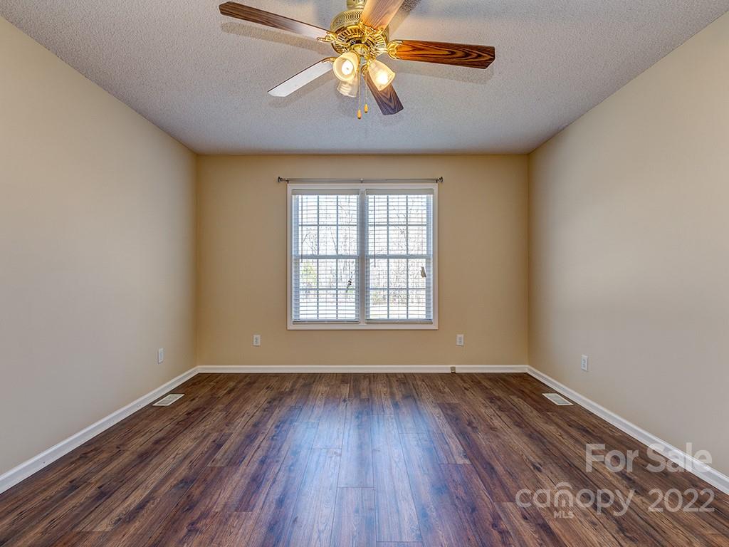 3488 State Rd S-29-330 Lancaster, SC 29720 - Photo 14 of 25 wooden floor in an empty room with a window