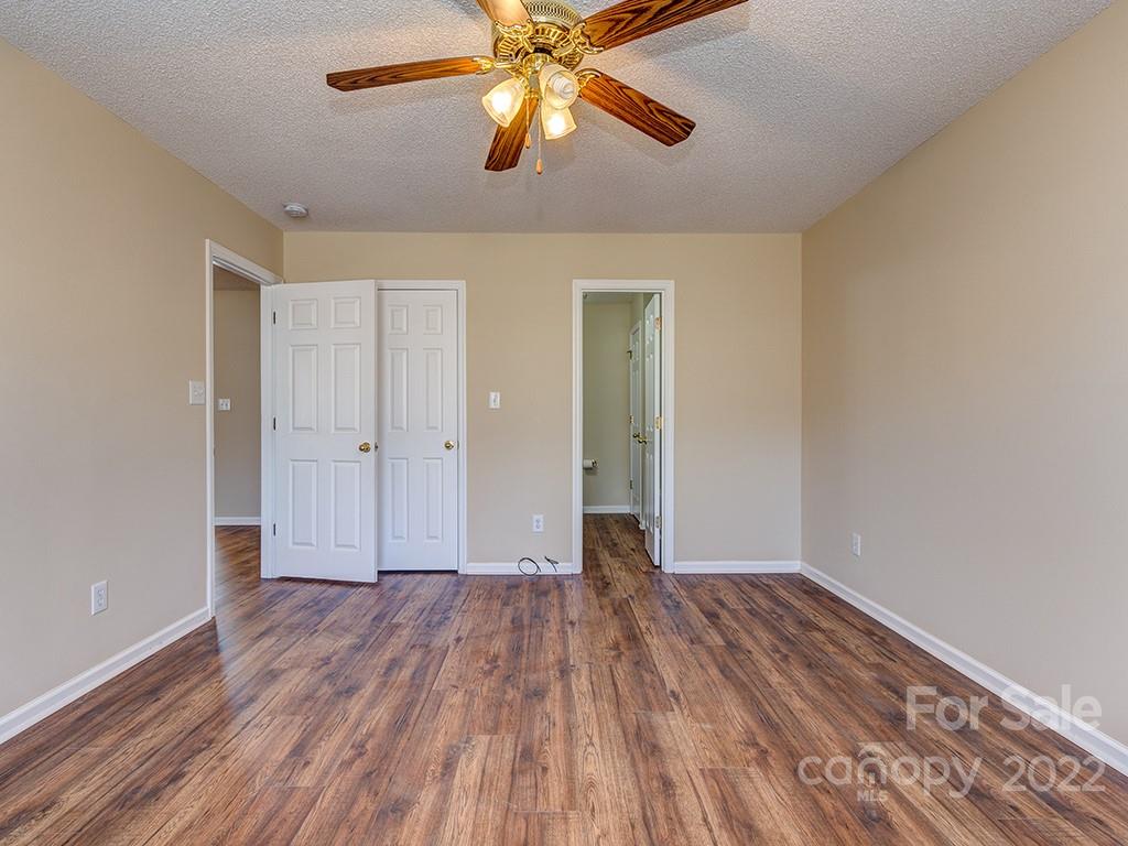 3488 State Rd S-29-330 Lancaster, SC 29720 - Photo 15 of 25 a view of room with a ceiling fan and wooden floor