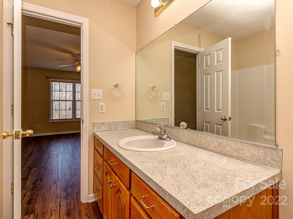 3488 State Rd S-29-330 Lancaster, SC 29720 - Photo 17 of 25 a bathroom with a sink and a mirror